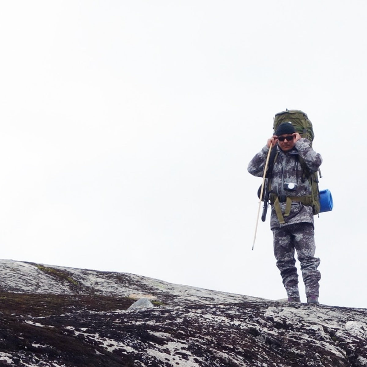 A rugged carbon-frame hunting backpack equipped for backcountry expeditions — built for durability, comfort, and modular performance.
